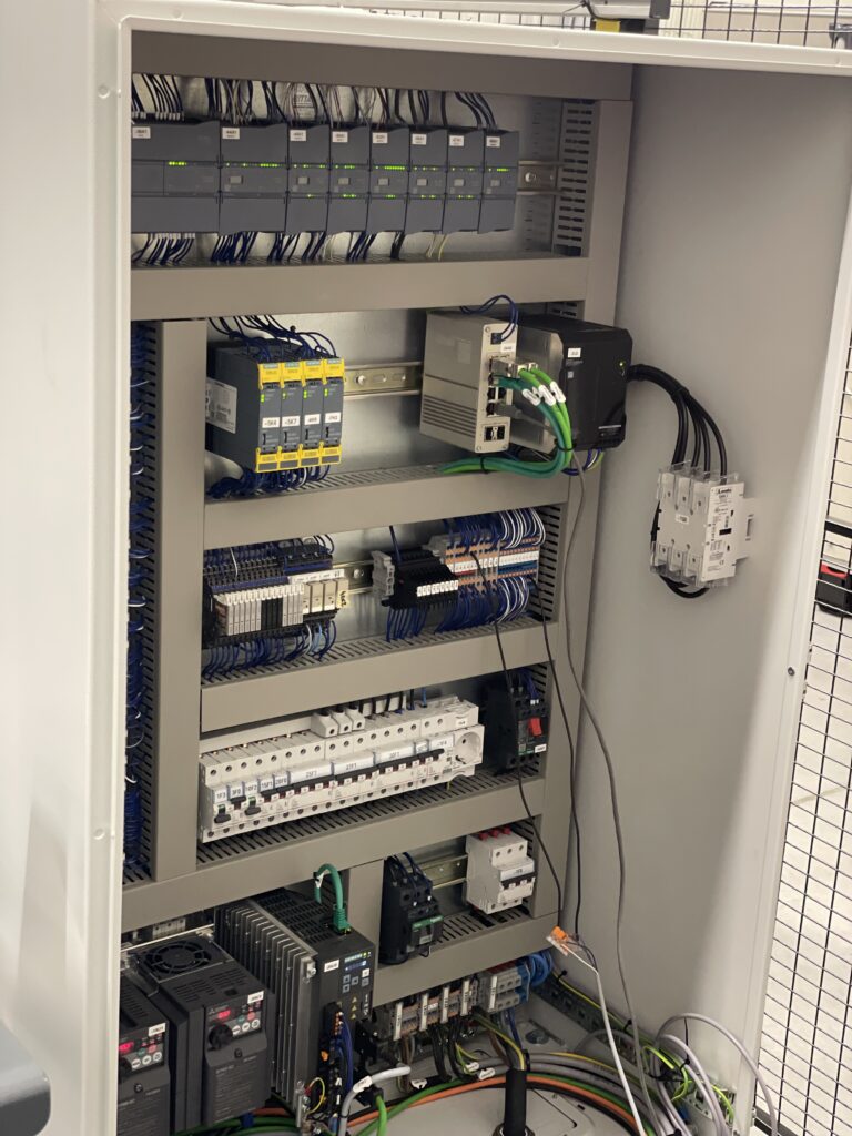 Picture of inside automation cabinet on production line